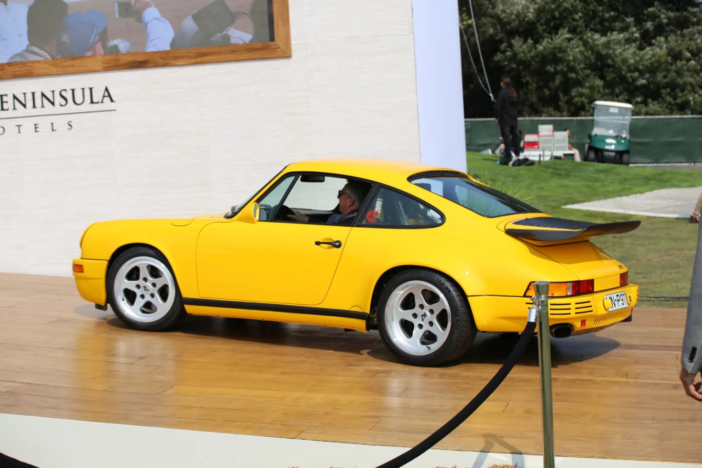 The original 1988 RUF CTR Yellowbird #001 took out the award for the special class. Owned by Bruce Meyer of California, that's the original first Yellowbird climbing the podium.