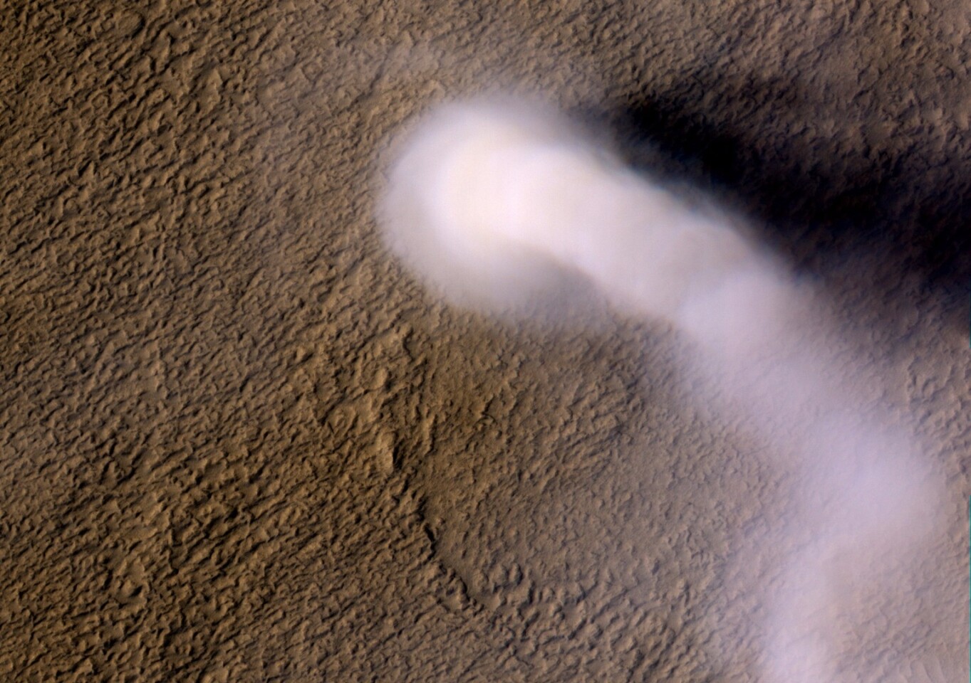 This dust devil captured in 2012 by NASA's Mars Reconnaissance Orbiter towered roughly 12 miles (20 km) above the Martian surface