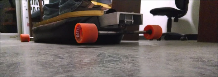 While early incarnations did away with the conventional skateboard trucks and wheels, these were later reintroduced to provide stability