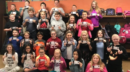 Students at Clinton Prairie Elementary School in Frankfort, Indiana, display their "boarding passes" for Mars
