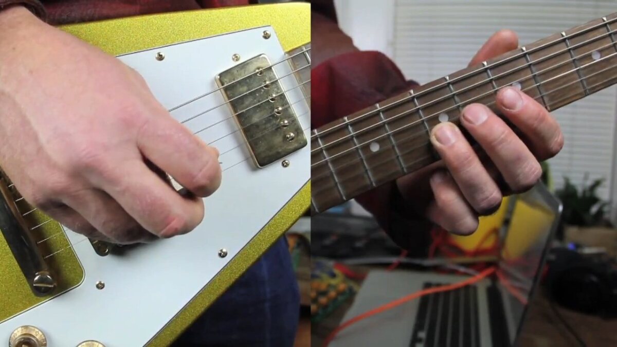 Computer keyboard keystrokes (including numbers, shift and delete keys) are allocated to fret positions on each string along the neck