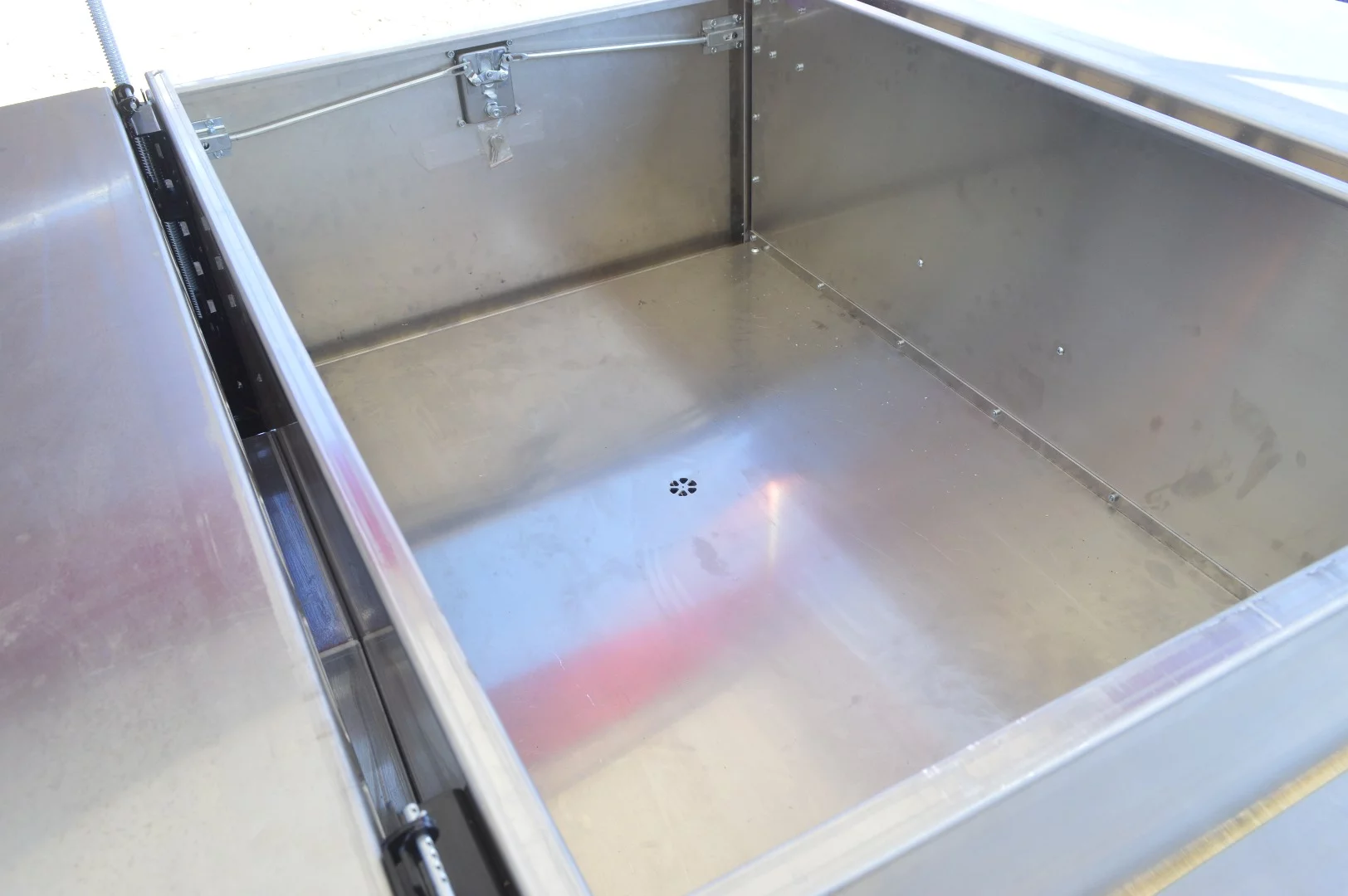 Inside, the CW-19 stores 21 cu ft of gear and includes a central drain for use as a shower tub