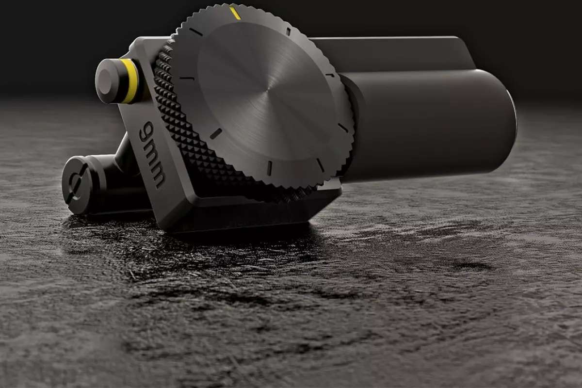 When it comes to unlocking the gun, users enter a pin code by turning a dial on the side of the attachment