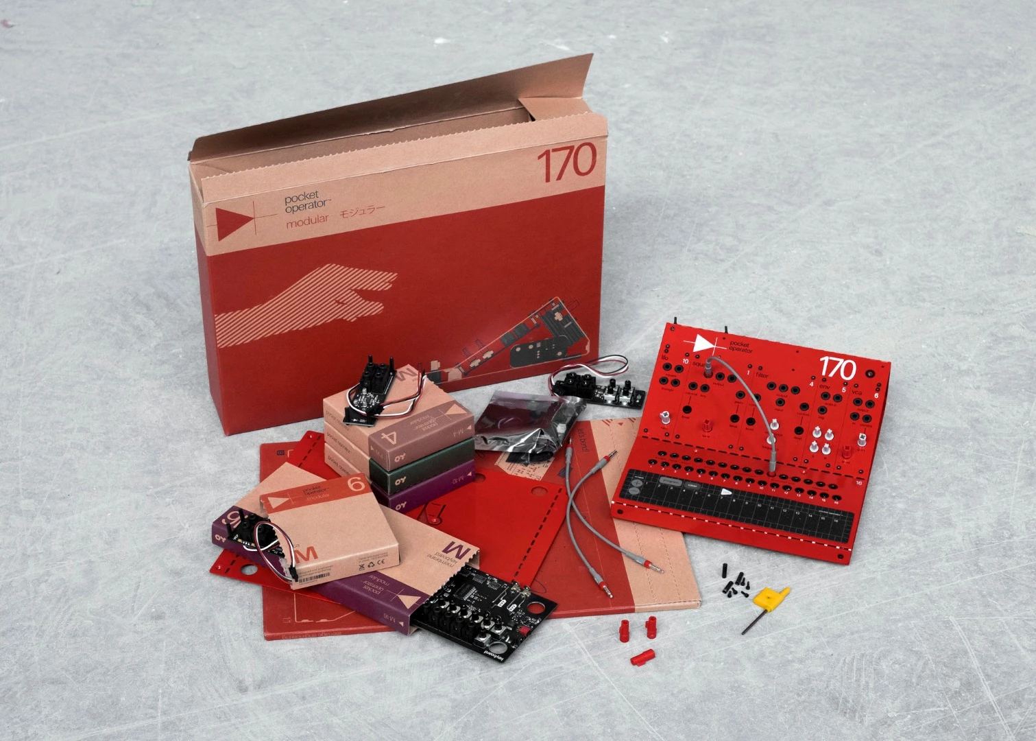 The Pocket Operator Modular 170 kit comes with a speaker box, battery pack, nine sound modules and eight patch cables