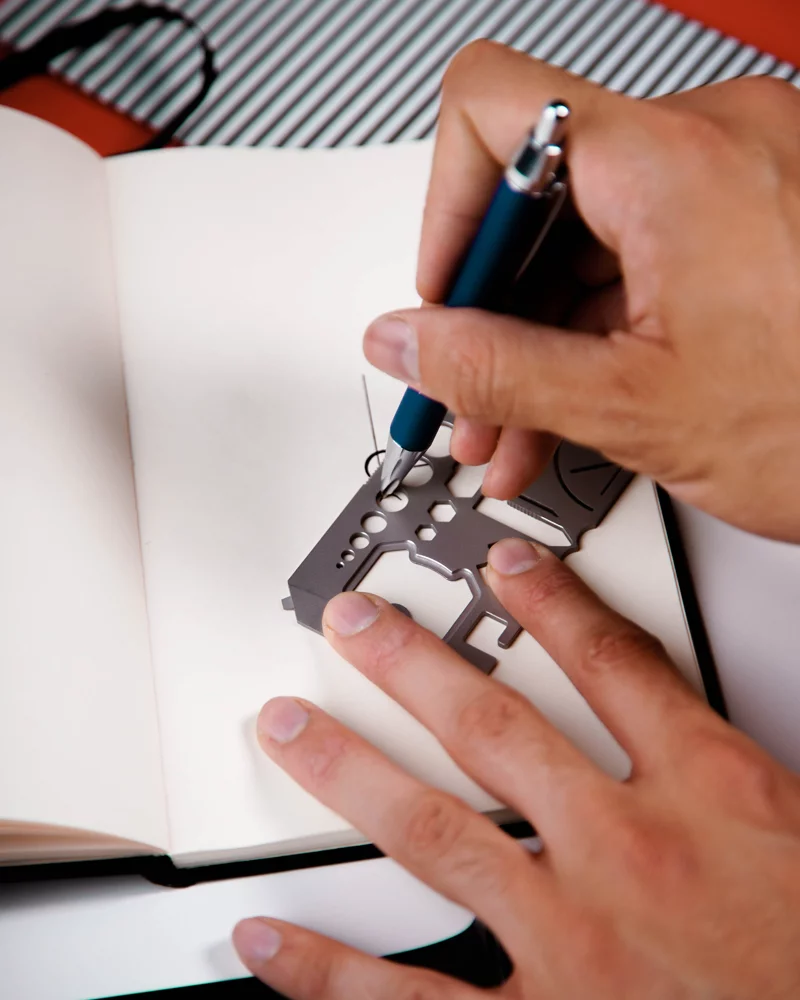 The MultiCard Multitool features a universal drill guide