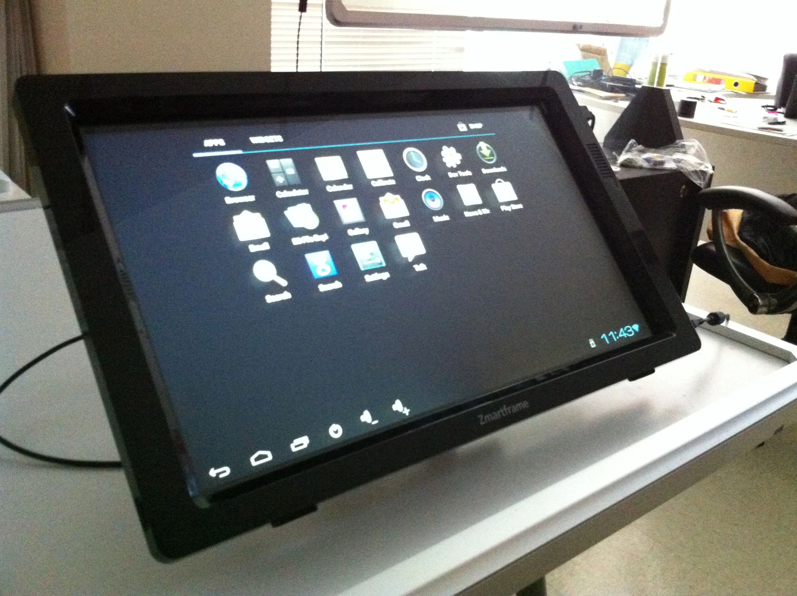 The Zmartframe attaches to regular monitors and transforms them into touch enabled devices