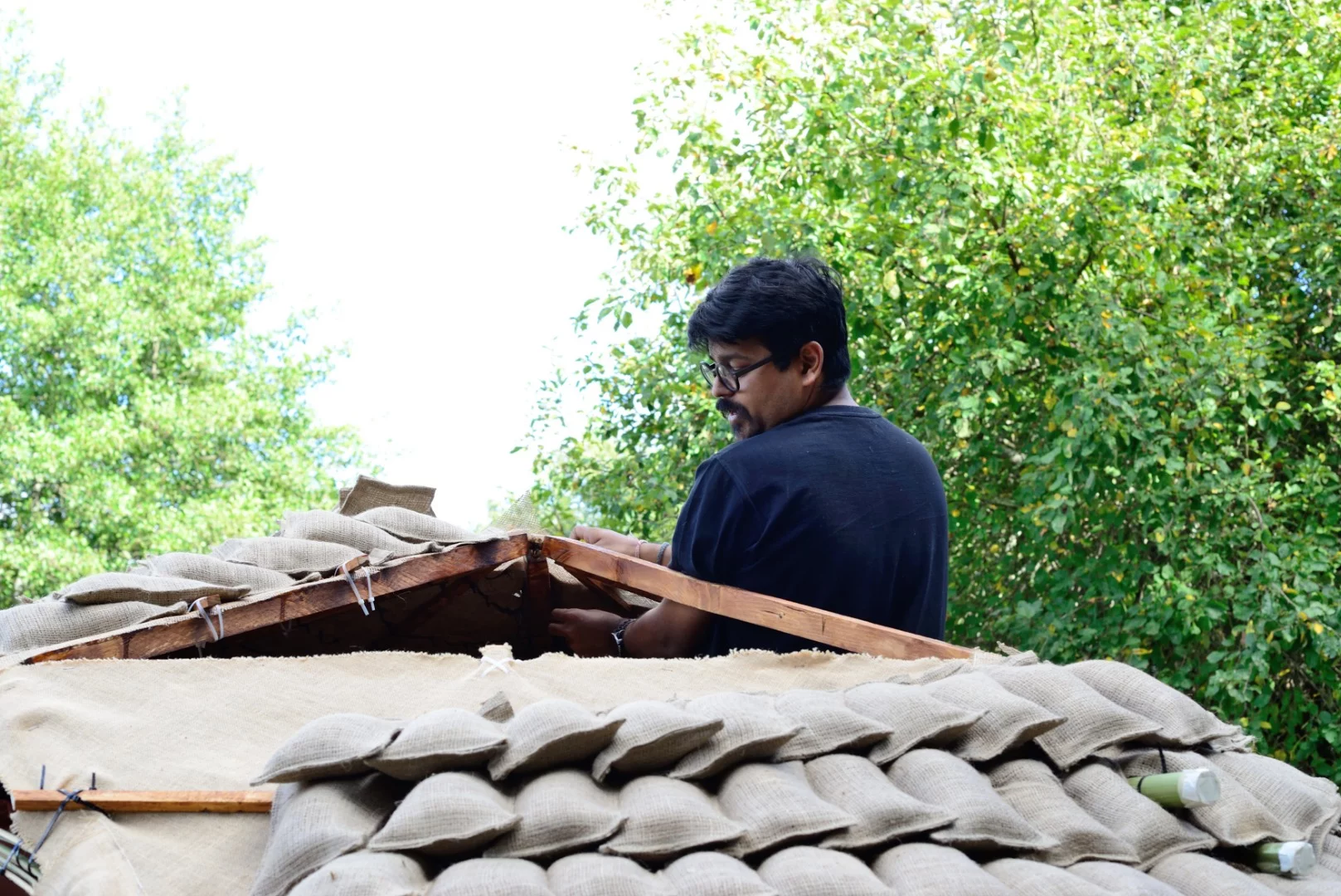 A worker toils away at Domaine de Boisbuchet