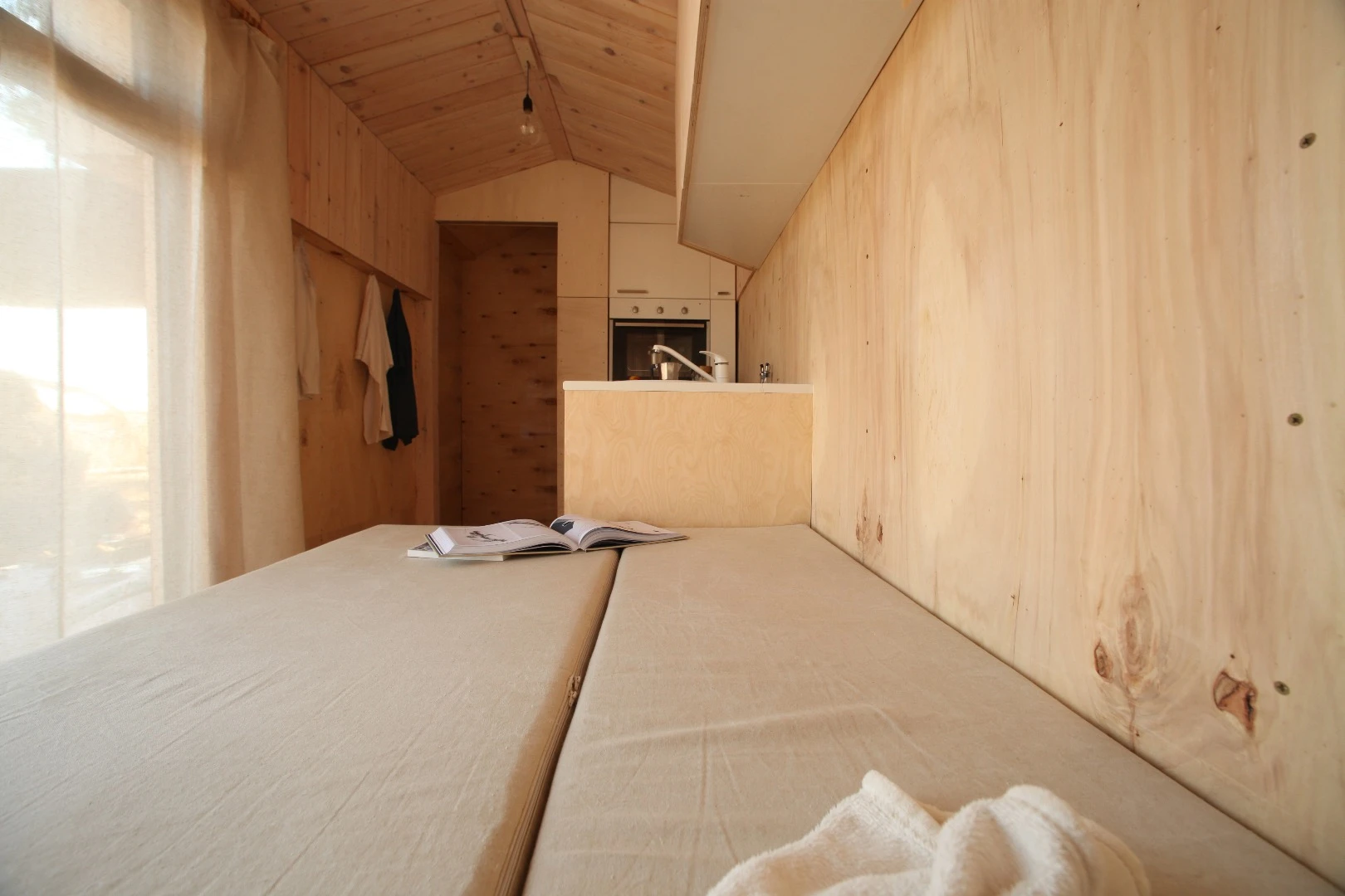 View from the sofa bed toward the kitchenette and toilet (not pictured)