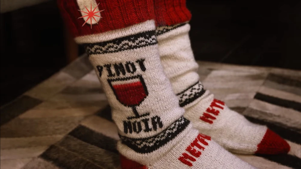 These Netflix socks are designed to pause your favorite show when you fall asleep in front of the TV