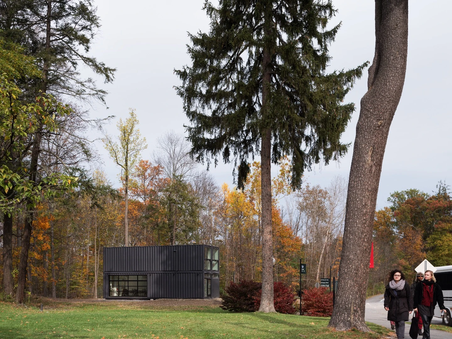 The Bard Media Lab consists of four recycled shipping containers painted black and stacked in a two up, two down configuration