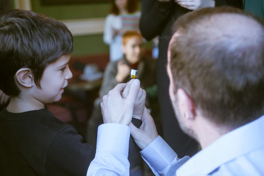 Babitz showing a child what the sensor can do