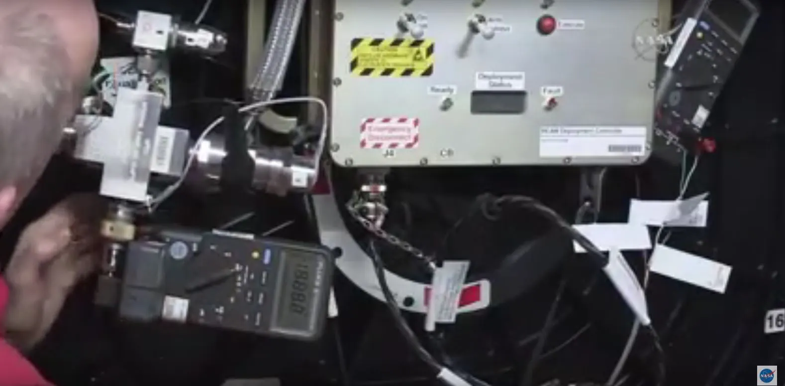Astronaut Jeff William's lettgin air into BEAM
