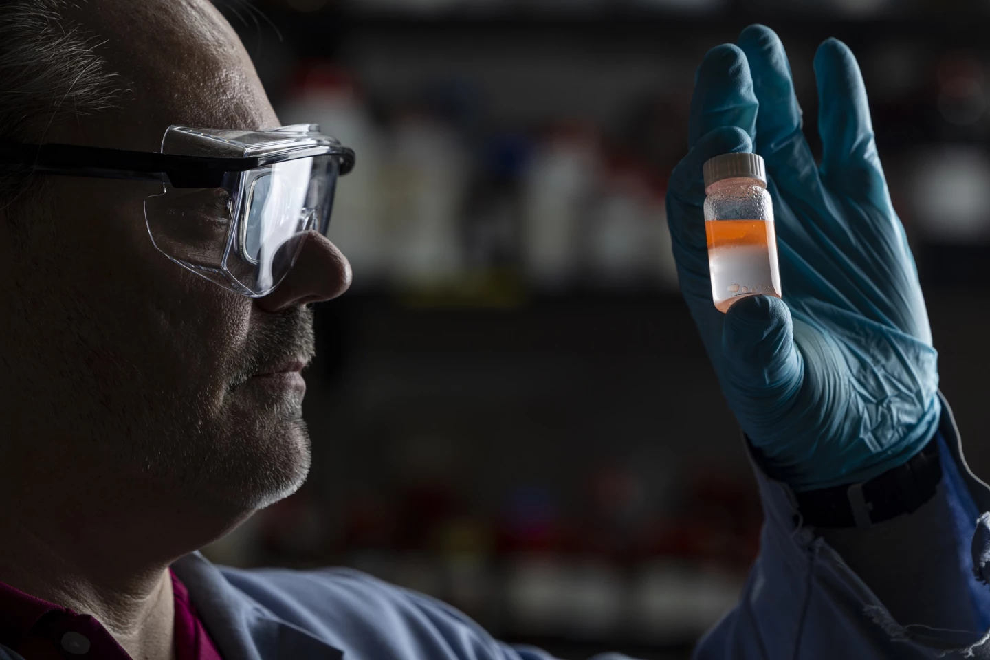 Gary Baker inspects a new solution to remove nanoplastics from contaminated water