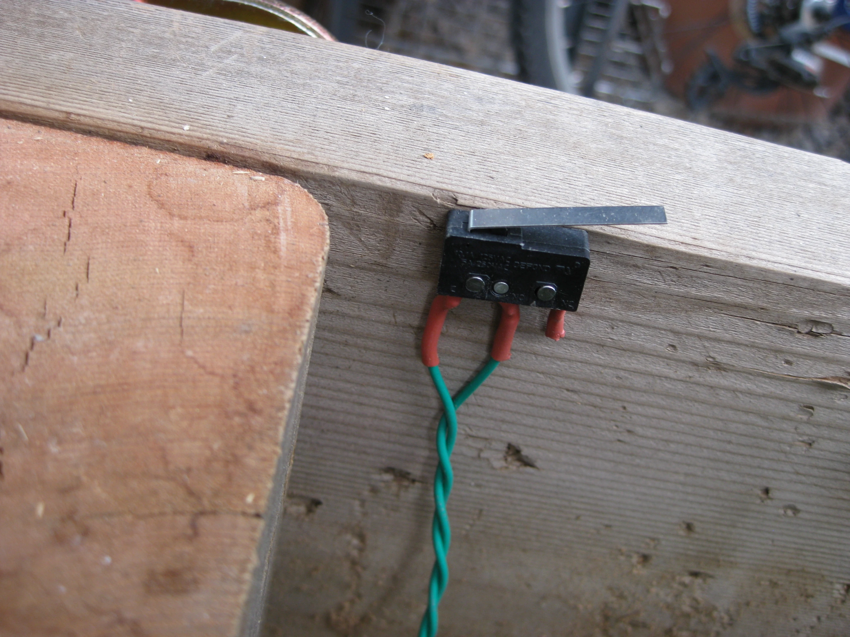 The switch that indicates whether the lid is open or closed