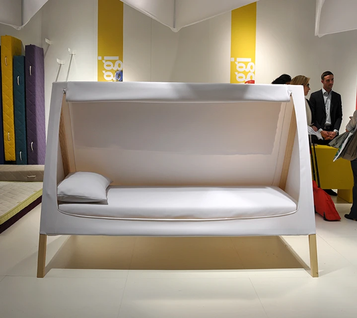 By opening the zip which frames the triangular sofa, a single bed with an overhead LED light is revealed (Photo: Edoardo Campanale/Gizmag.com)