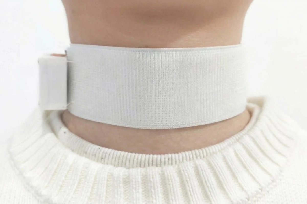 The Revoice device uses two AI agents to detect the wearer's silently mouthed speech and emotional state, outputting speech via a synthetic voice module