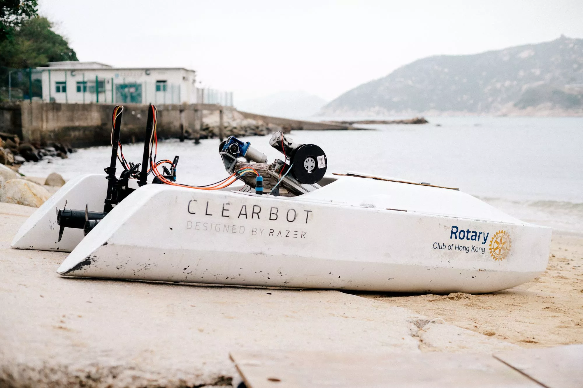 An AI camera is onboard to snap a photo of floating trash picked up during operations, for upload to a cloud database for analysis