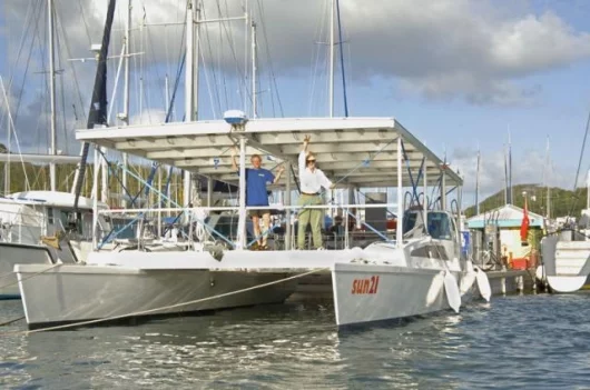 Martin Vosseler and Beat von Scarpatetti aboard the sun21in the harbor of Le Marin (Martinique)