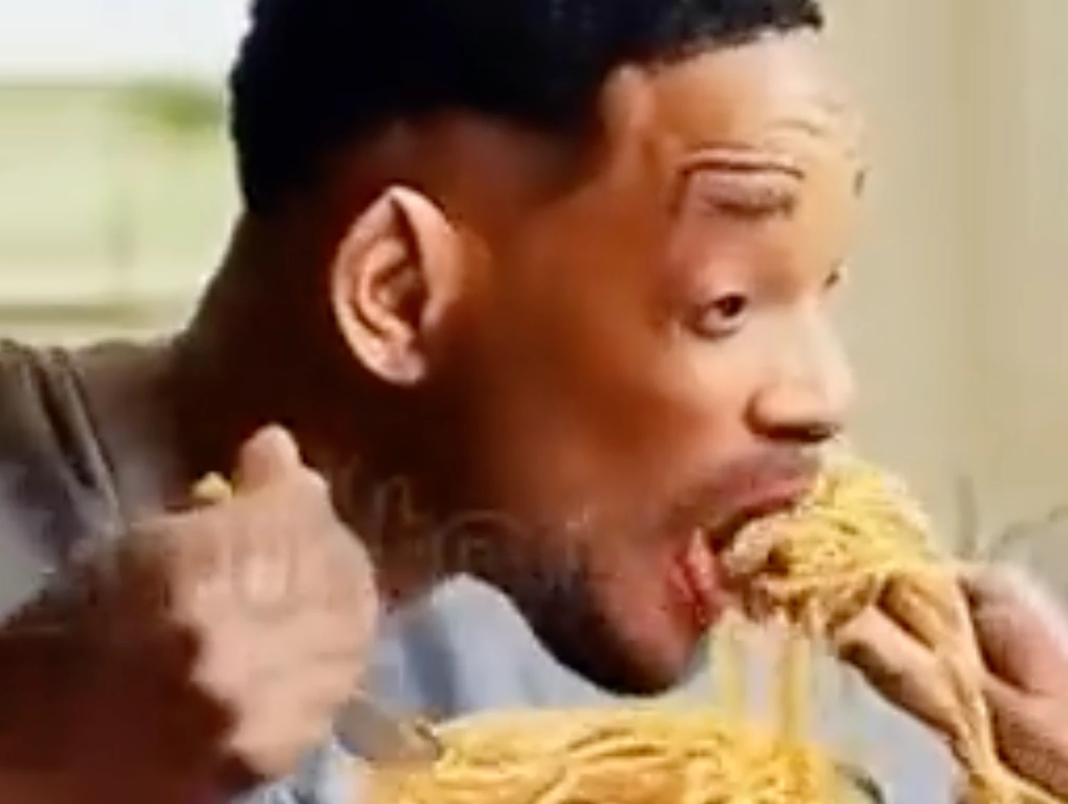 Will Smith eating spaghetti in a video generated by Modelscope, with a faint logo from Shutterstock revealing its source