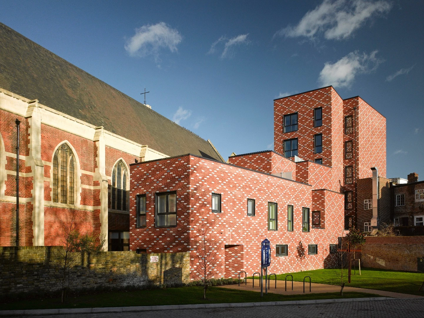 St Mary of Eton Church, by Matthew Lloyd Architects, features three new buildings constructed in a red brick added to the existing church