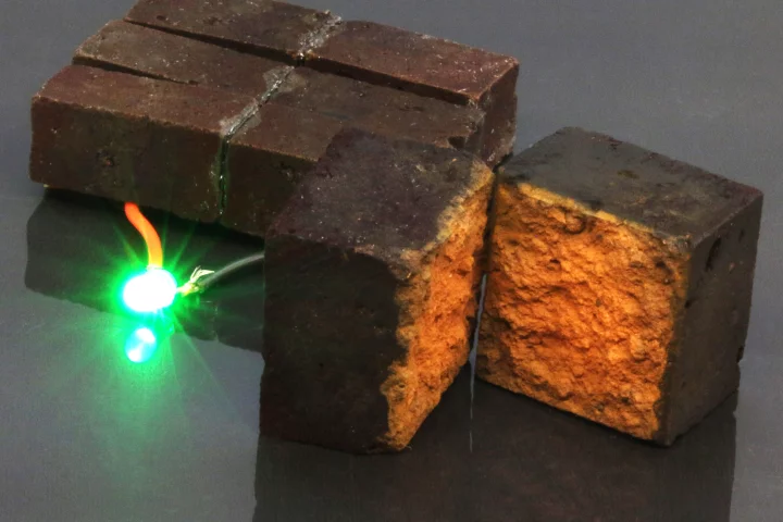 A PEDOT-coated brick powers a green LED