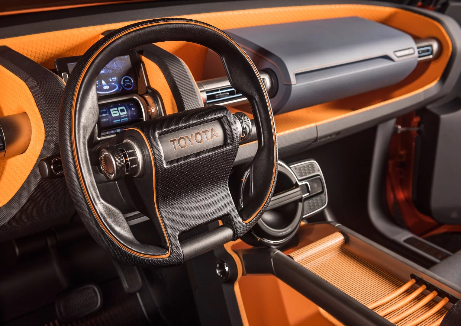 The driver's cockpit of the FT-4X features an integrated smartphone mount where the phone becomes the vehicle's instrumentation and navigation system