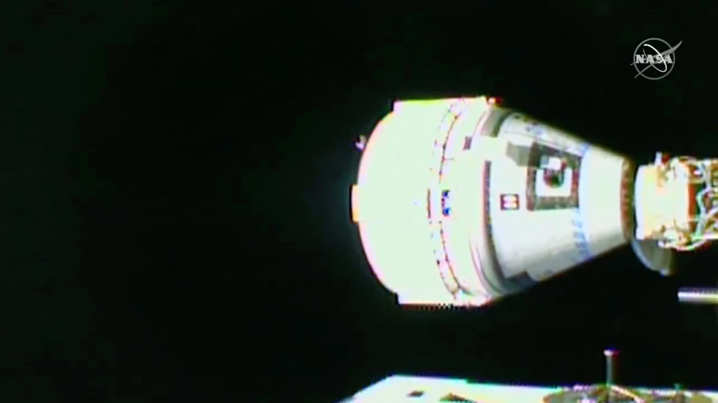 Starliner docking with the ISS