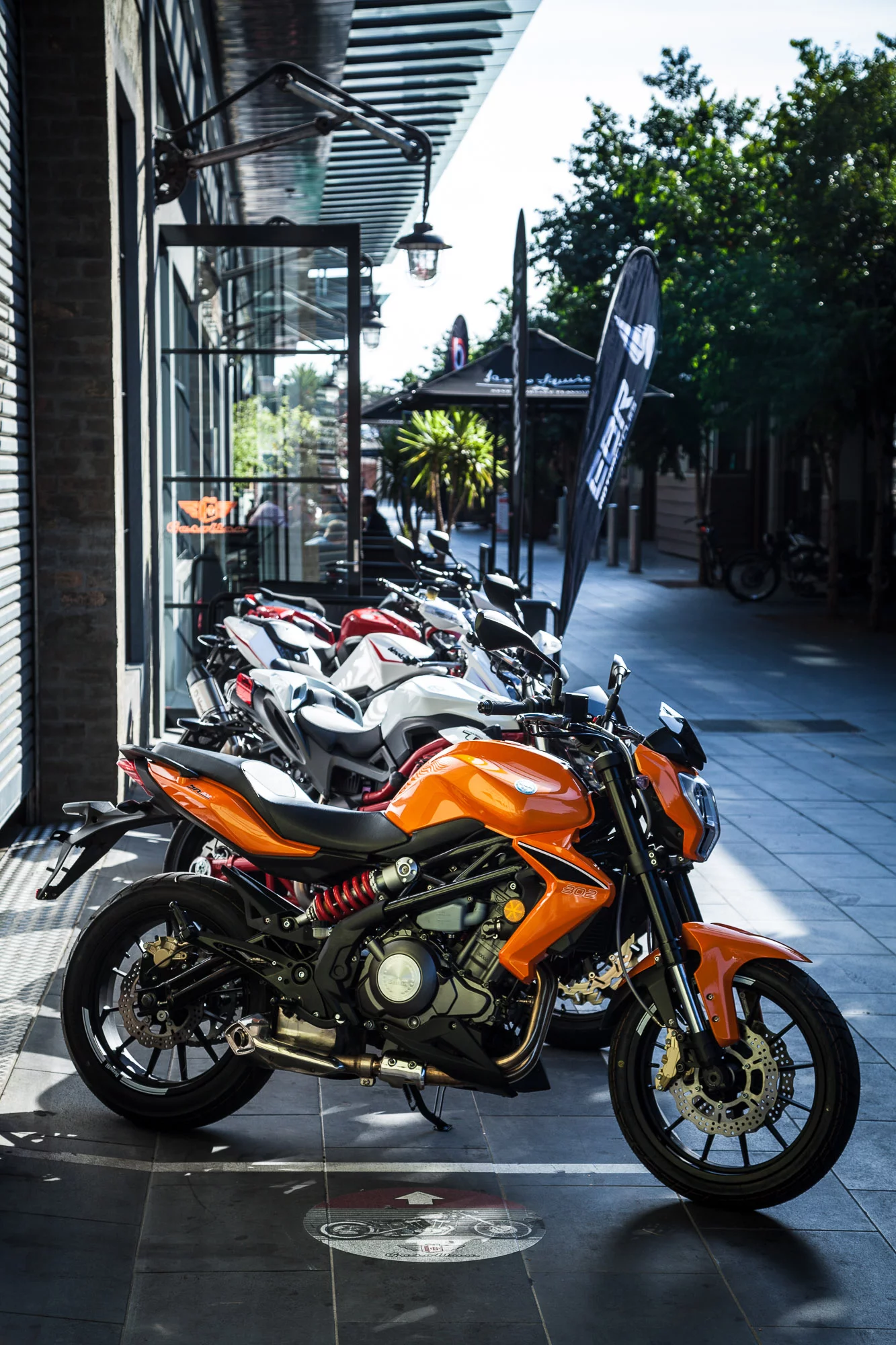 The Benelli BN302 in front of a murderer's row of stablemates, including the TnT 1130 (Photo: Loz Blain)
