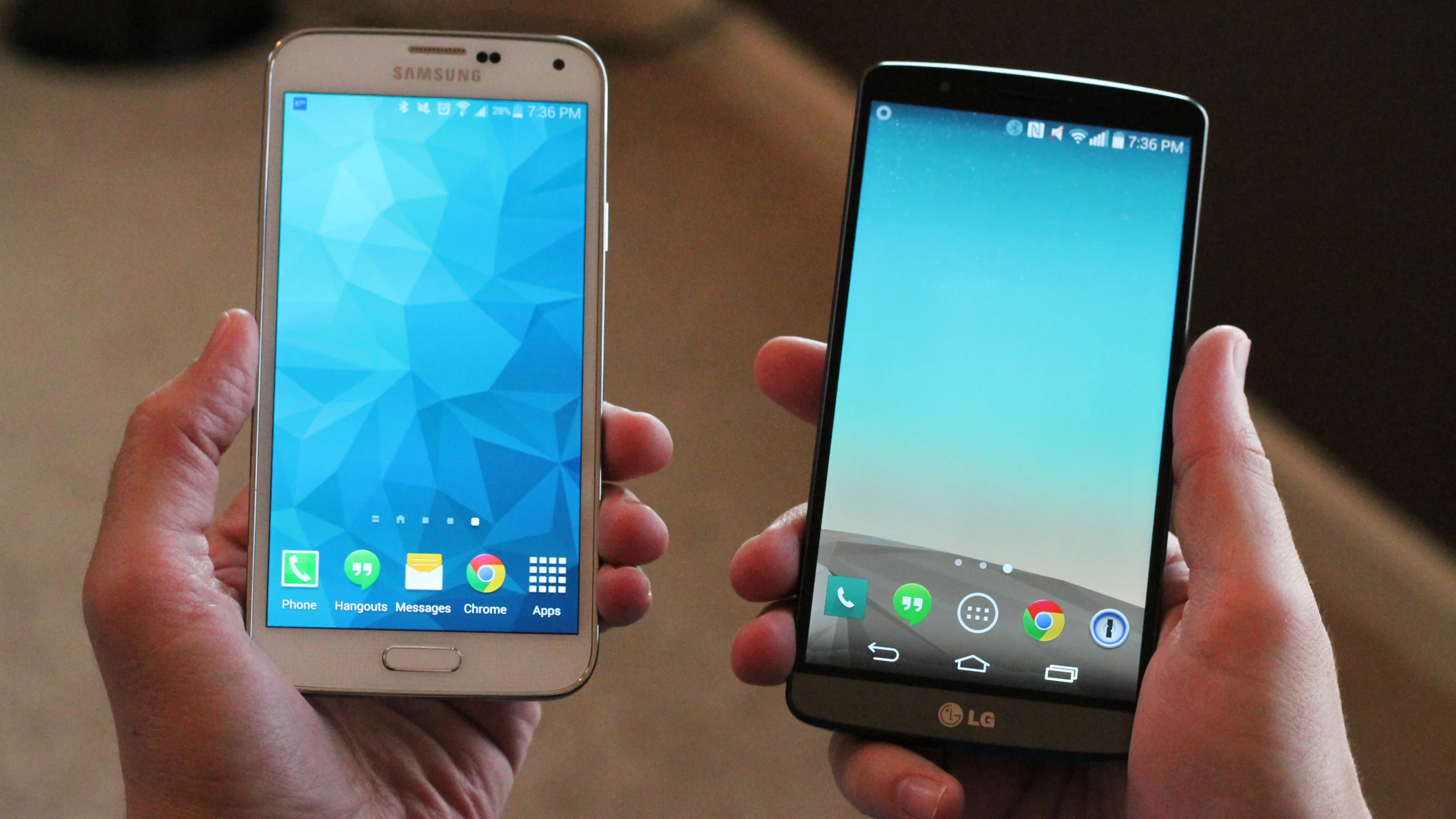 Both phones feel pretty comfortable in hand, but the GS5 fits ours a bit more naturally