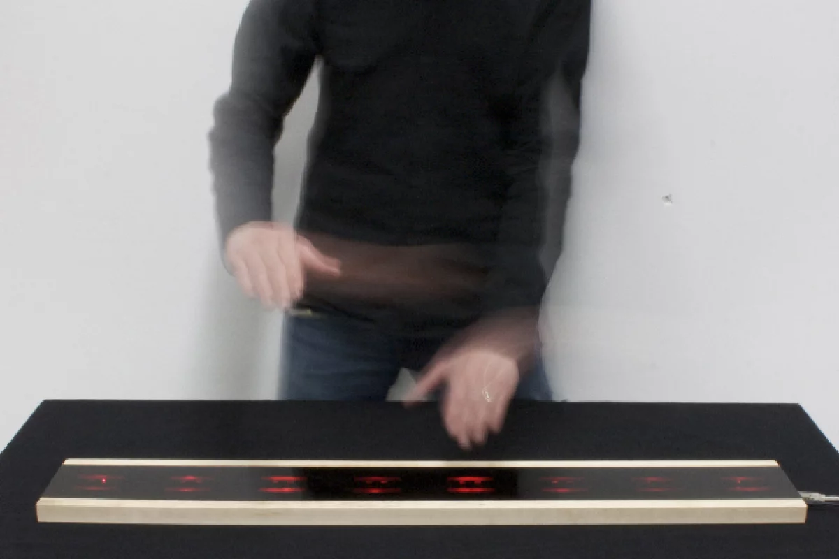 Each of the eight Infrared proximity sensors across the surface of the Airpiano can register and play three notes depending on the user's vertical hand position