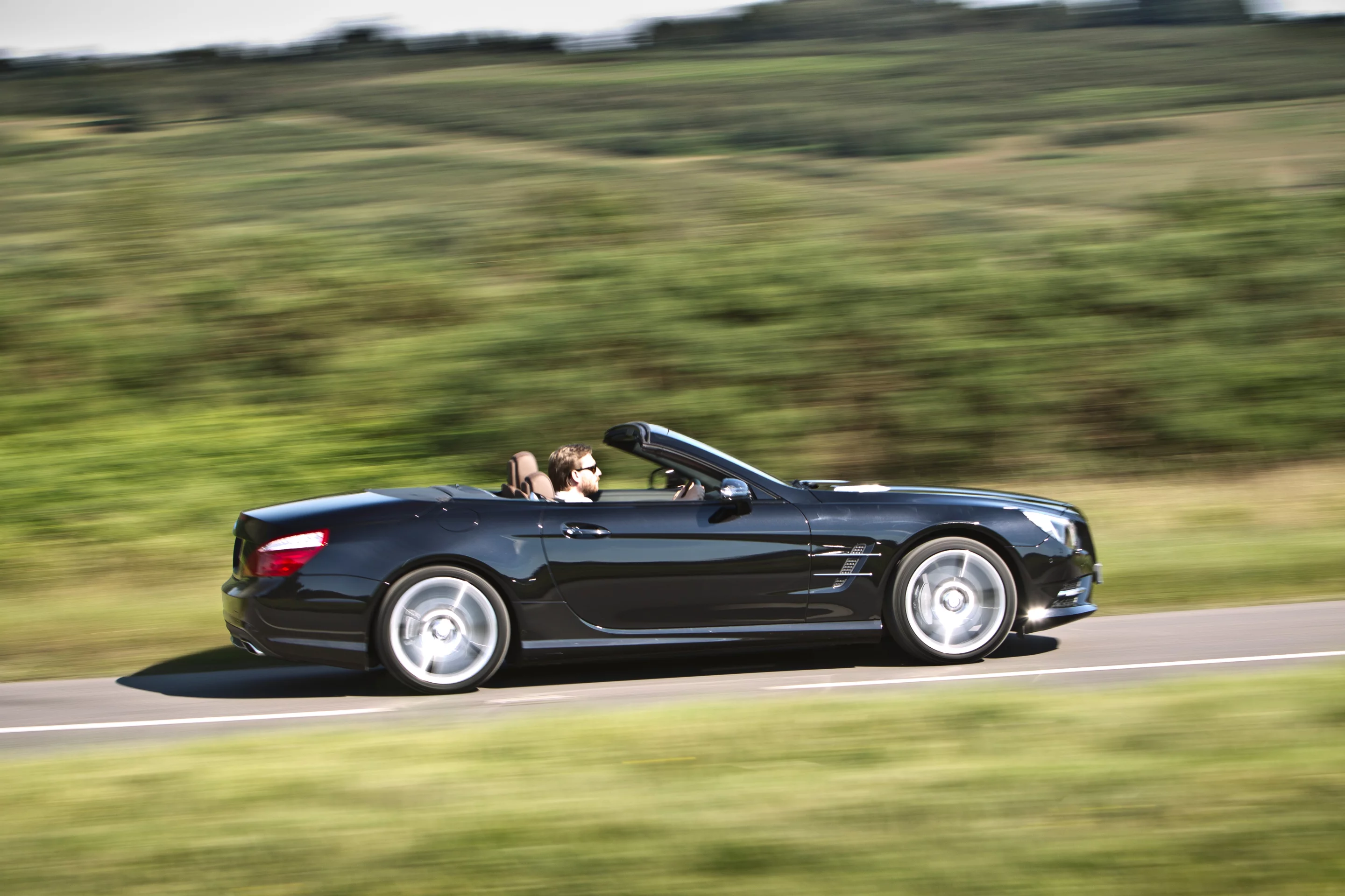 Open air fun is the specialty of the SL 400, with heated seats making cool weather top down driving enjoyable
