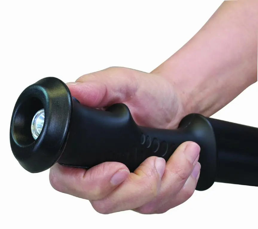 The Hike 'n Strike handle includes an LED flashlight and spike electrodes (under the outer ring cover)