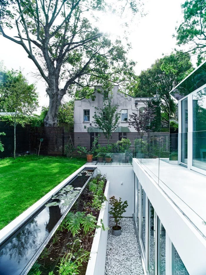 The Covert House boasts sustainable features that include rainwater collection and solar panels