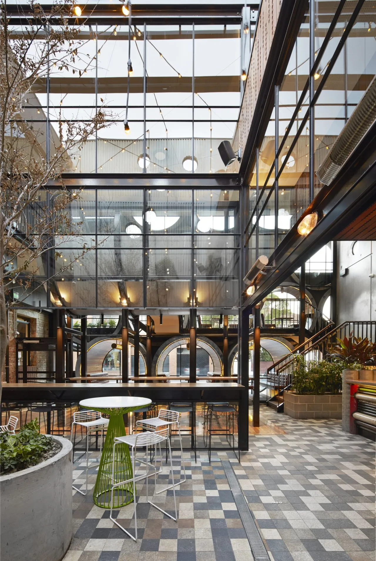 During the day time, the pipe facade fills the interior space with an abundance of natural light,