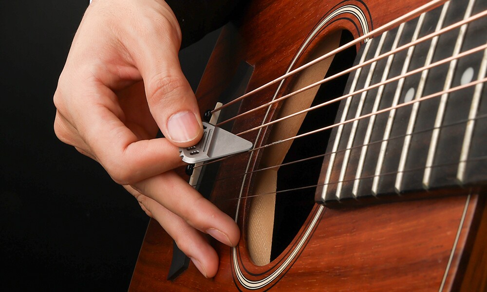 Bring your metal chops to life with groovy titanium guitar pick