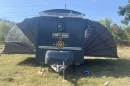 Hit a button on the remote, and the Mini House expands automatically to nearly three times its towing size