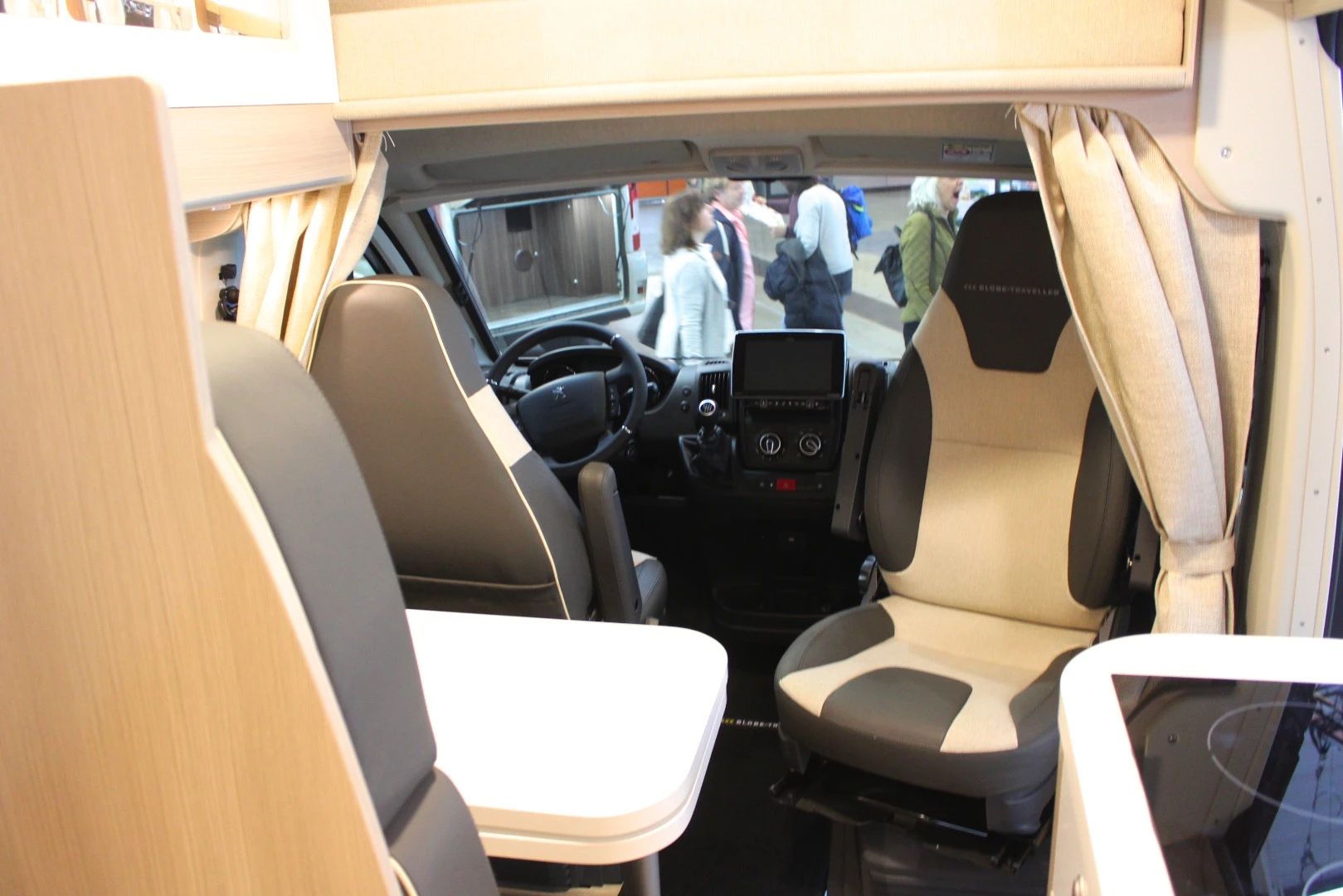 Inside the €73,323 Globe Traveller Voyager XS; the high-roof includes a retractable bed
