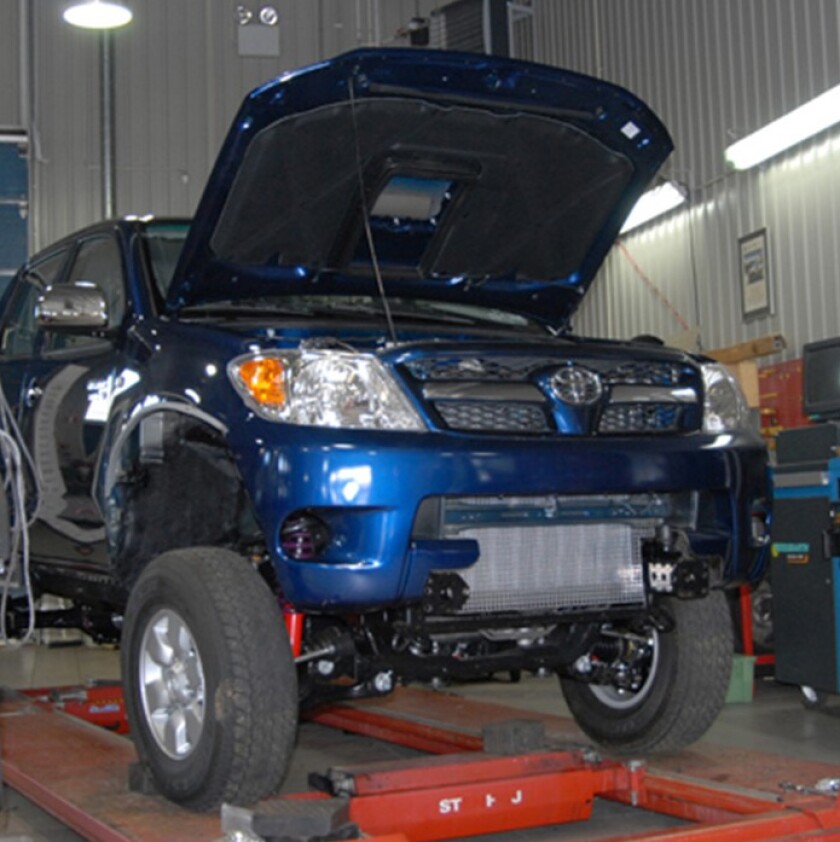 Toyota 4WD during modification - note ridiculously small standard tires.