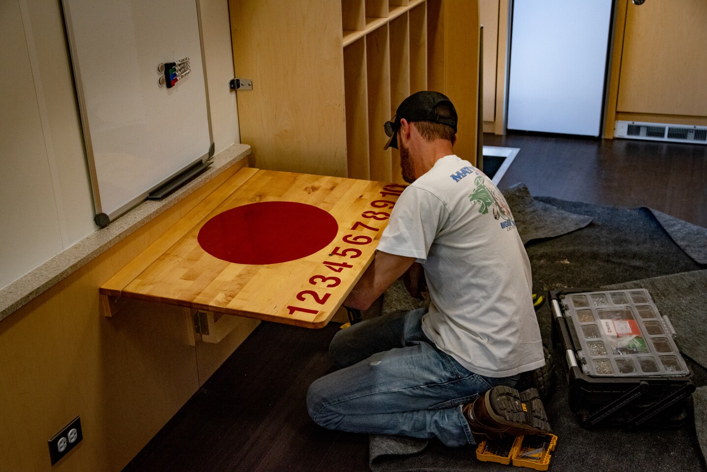 Upfitting and customization of the Magic Bus included installing work and play areas