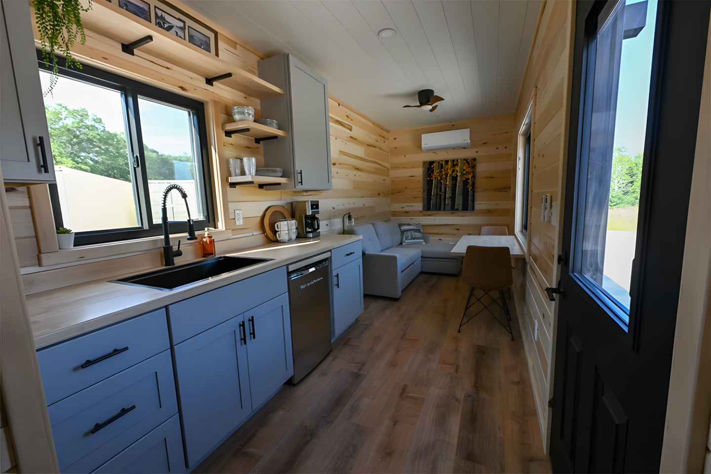 The Augustine's interior is finished in pine walls, with vinyl flooring, and shiplap ceiling
