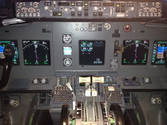 The 737 simulator's throttle pedestal, flight control unit, control display unit, data interfaces and panels