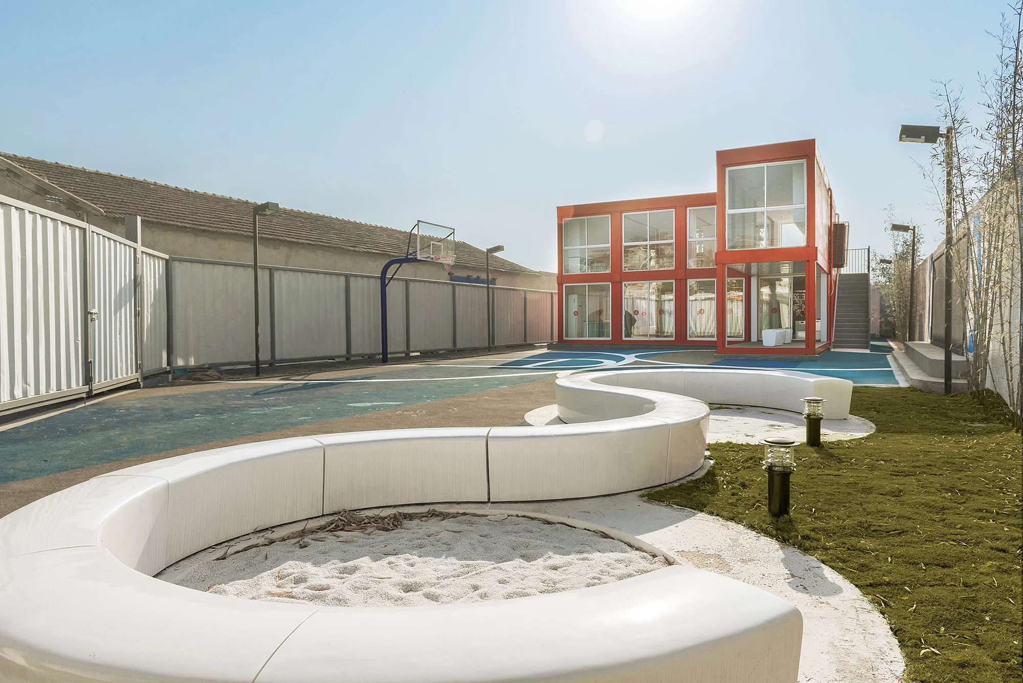 Excess corrugated metal was cleverly re-used as a security fence that encloses the area (Photo: Marco Jacobs)