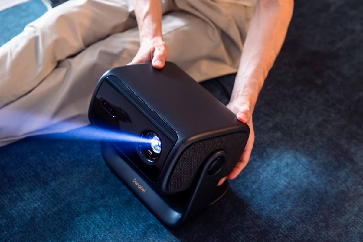 "The Dangbei MP1 Max redefines home cinema with Triple Laser + LED hybrid technology, 3100 ISO Lumens brightness, and HDR 10+, Dolby Audio, and DTS Virtual:X for immersive visuals and sound"