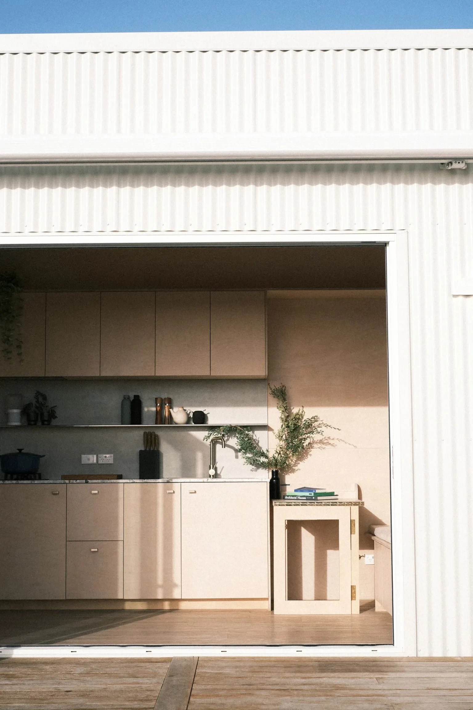 The Fowler & Ward x Base Cabin's large bifold doors really help open up the home to the outside