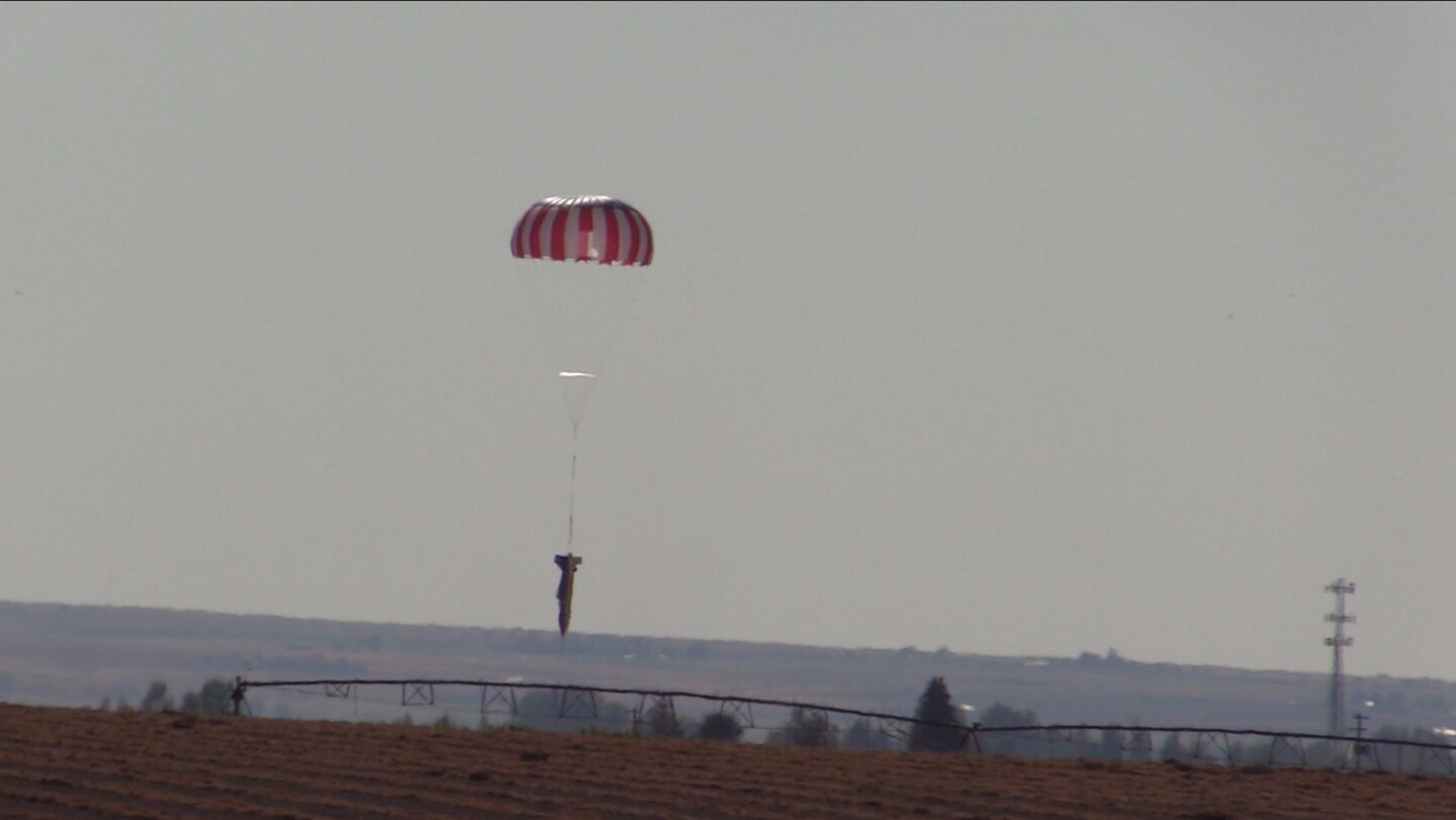 Eddie Braun floats toward a distant bean field aboard the Evel Spirit, and into the history books