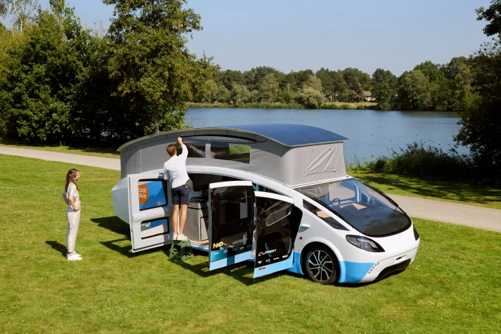 Stella Vita's PV-packed roof can be raised at camp to give its two occupants room to stand upright inside