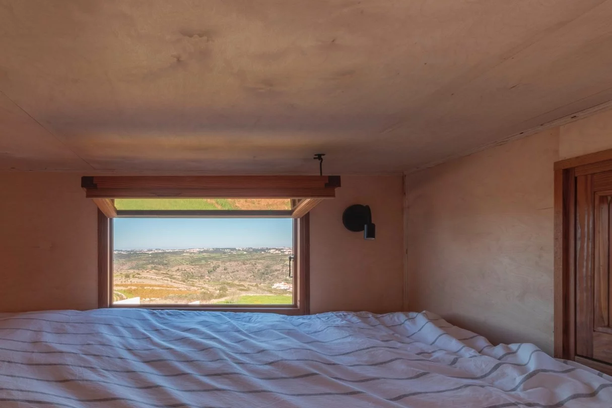 The Vigia features just one bedroom, which is a loft-style space with a low ceiling