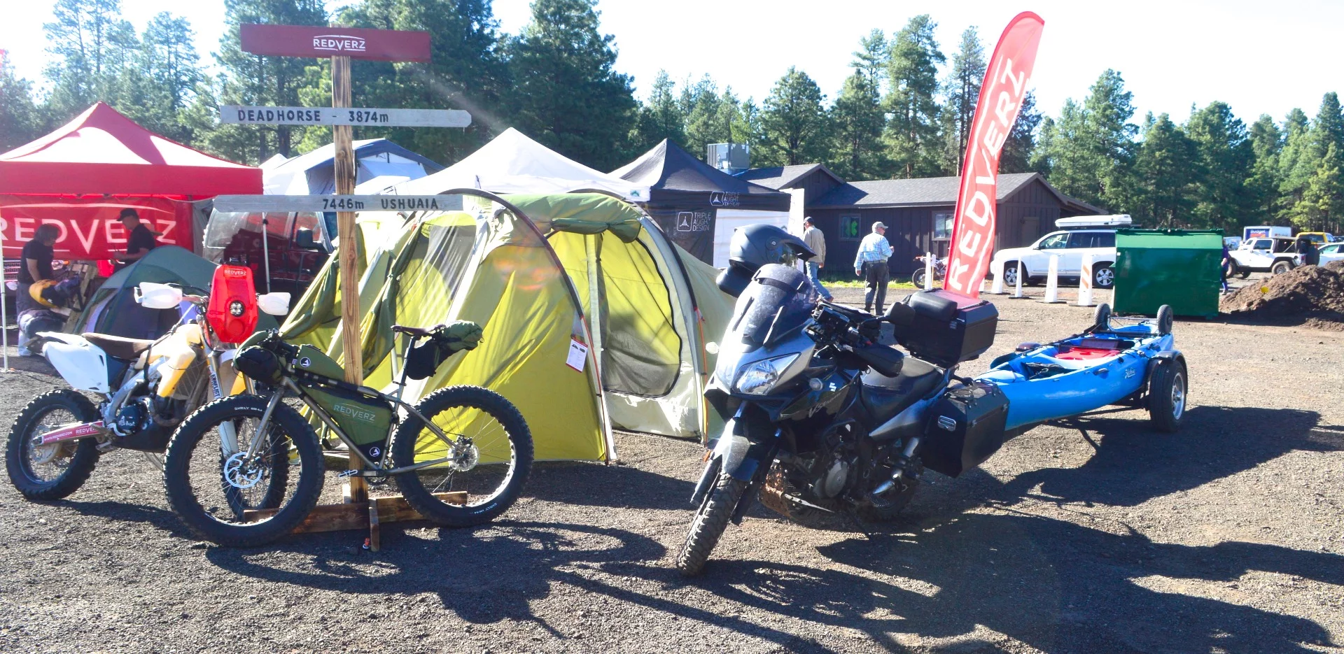 Some bikes, motor and otherwise, gathered at the Redverz booth - we like the one towing the kayak the best