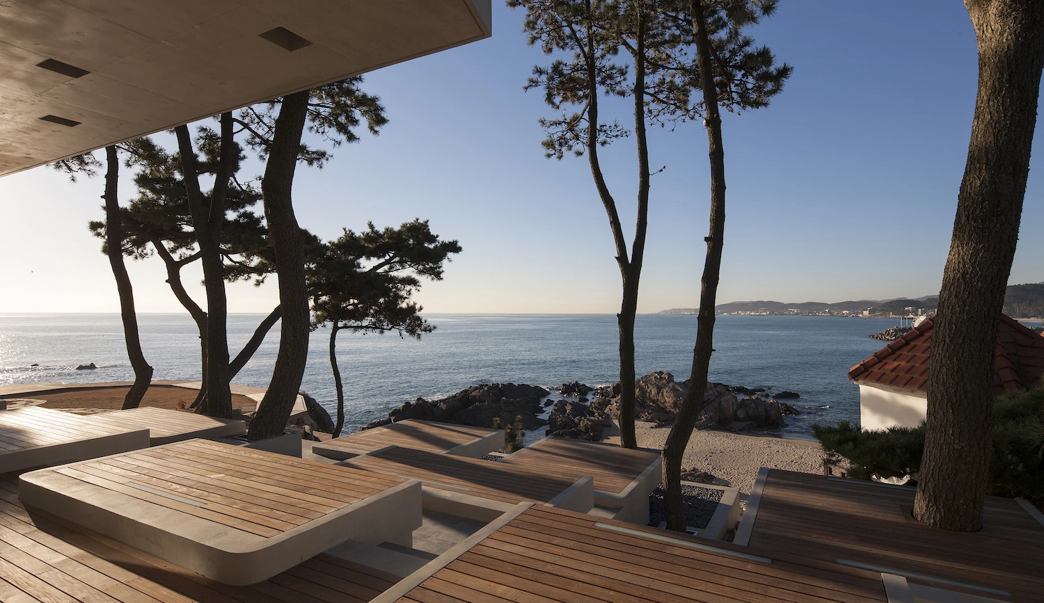 For seating, Heesoo Kwak and IDMM Architects installed multiple stepped wooden platforms