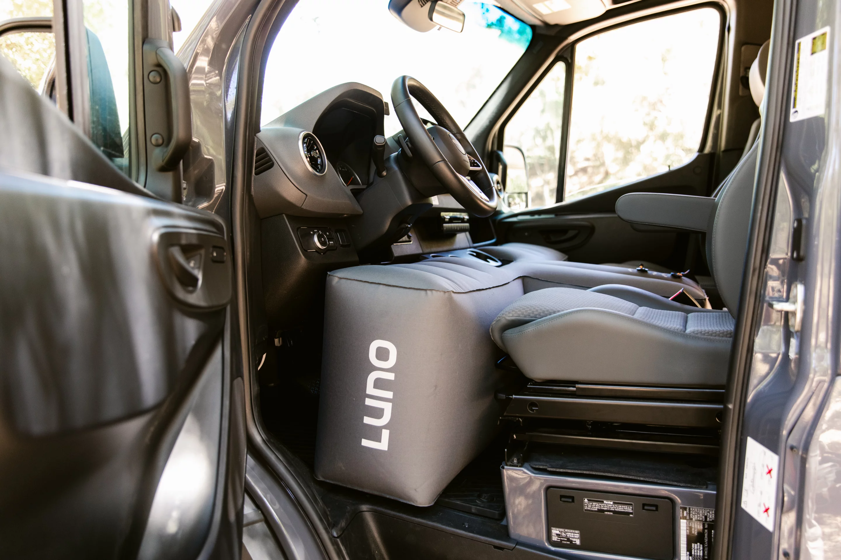 Installing the kit requires moving the seats all the way back and down